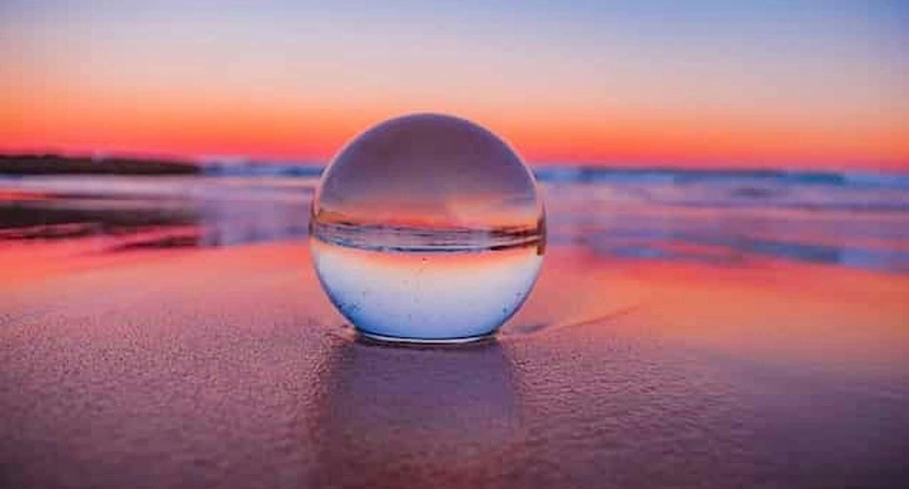 Crystal ball on the beach