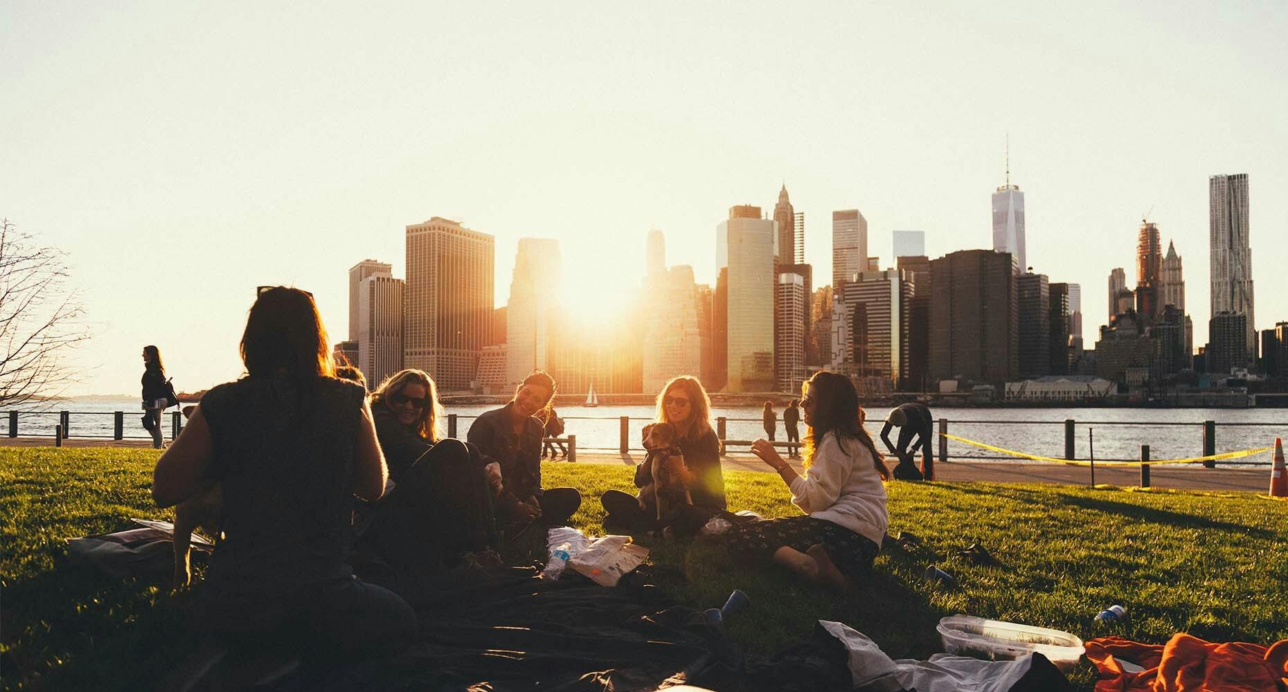Group of people on a picnic in a city park