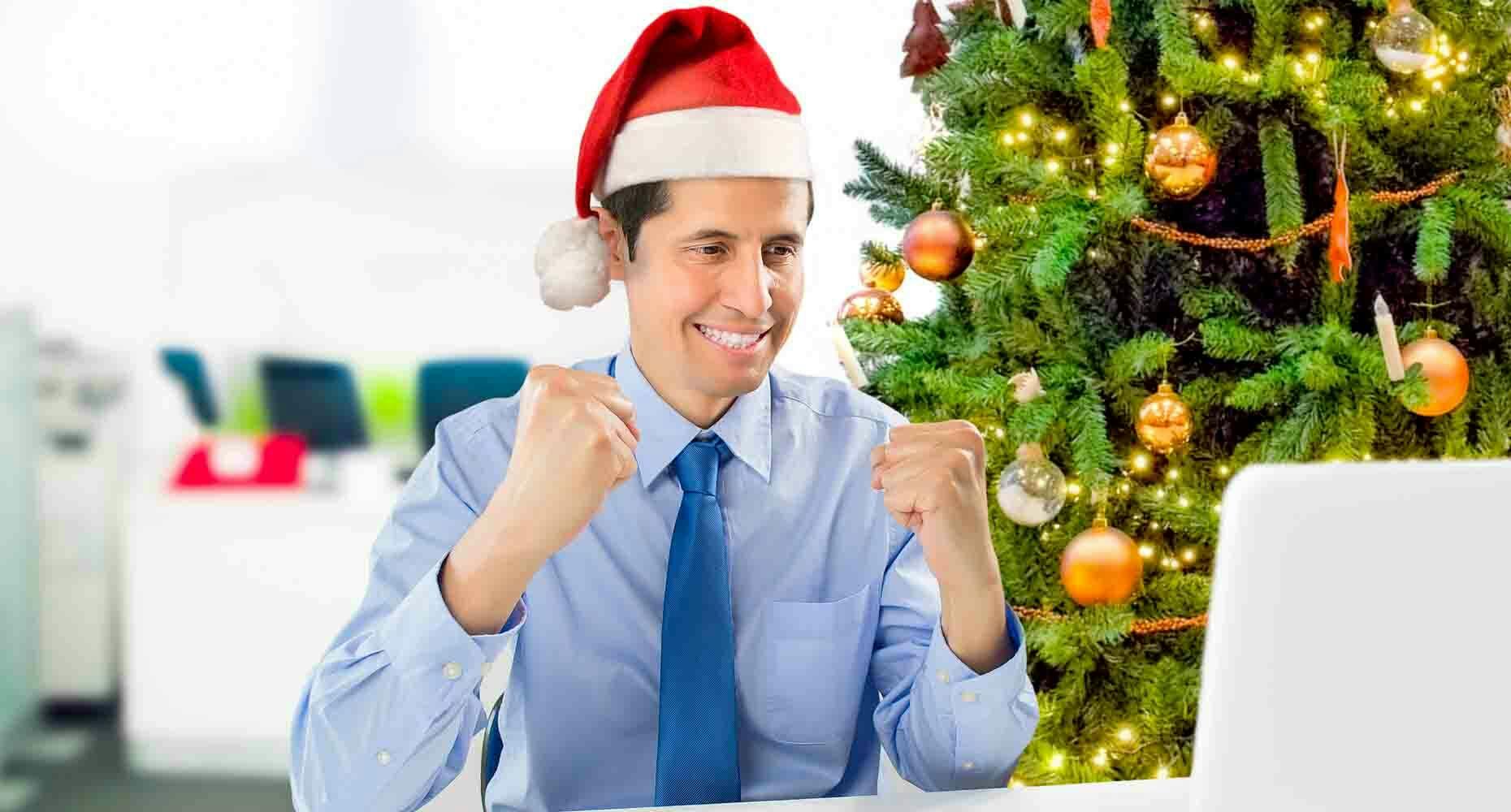 Happy sales person with a santa hat